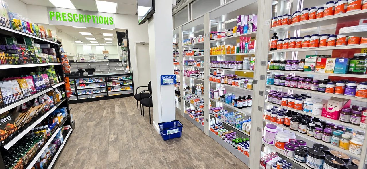 Inside Tree of Life RX, with vitamin and supplement shelves beside the prescription counter